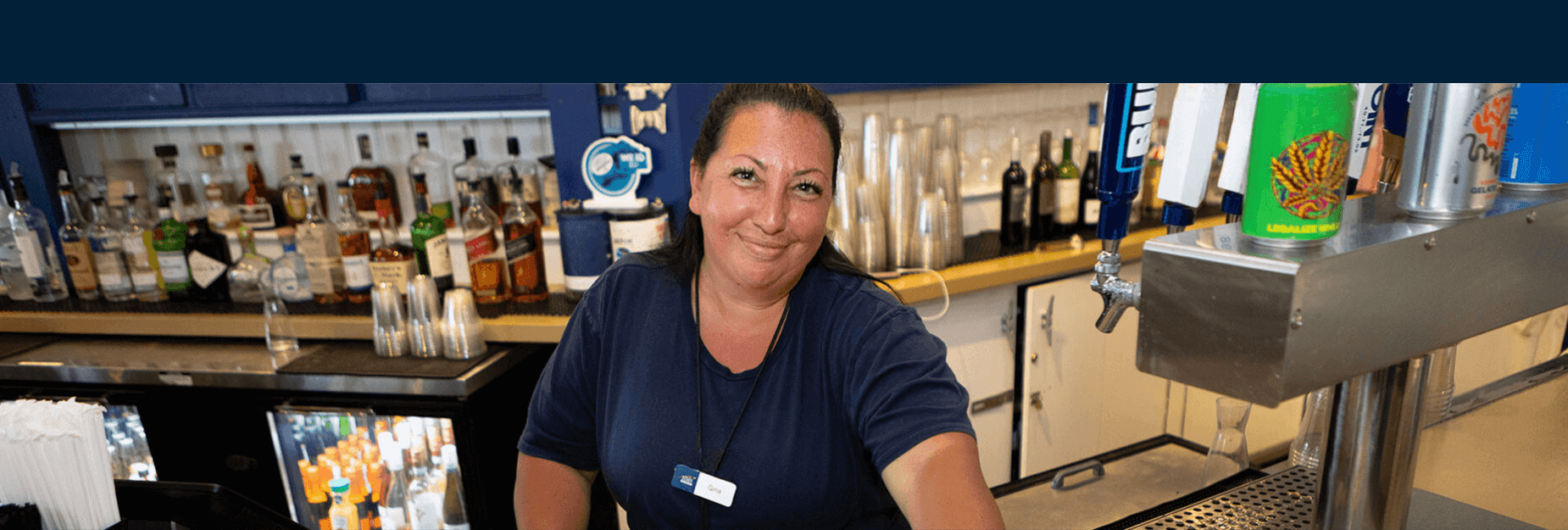 Image of worker at airport restaurant and pub