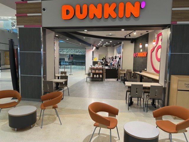 The Dunkin' location and seating at Long Island MacArthur Airport