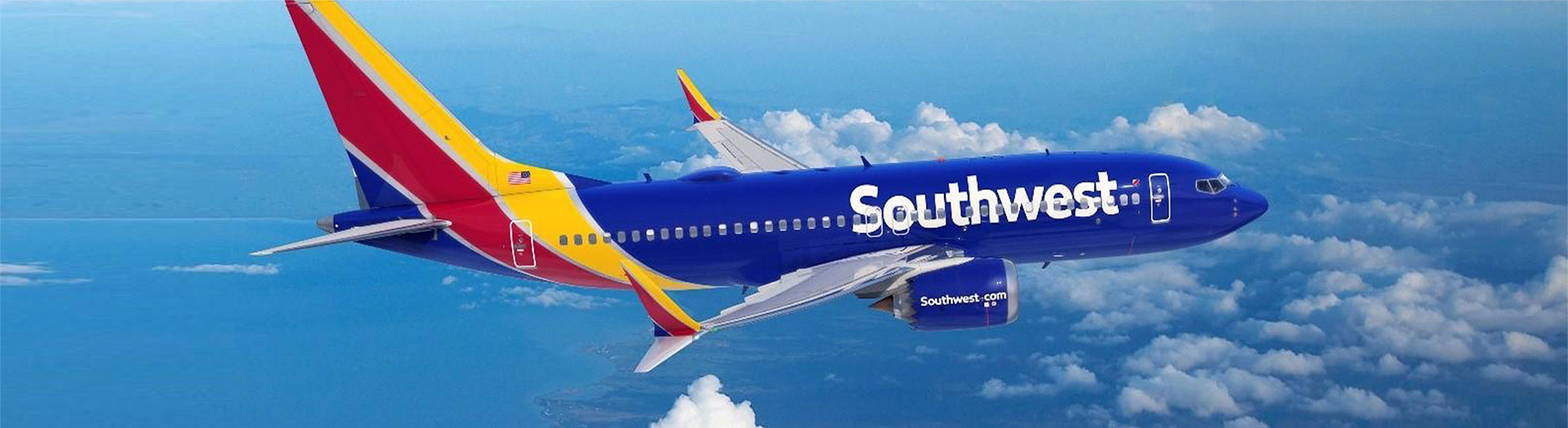 Southwest airplane flying through sky