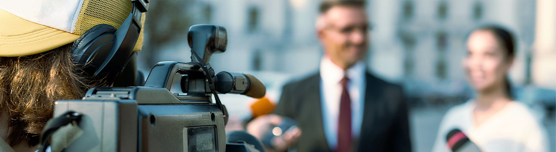 Image of journalist conducting an on-camera interview 